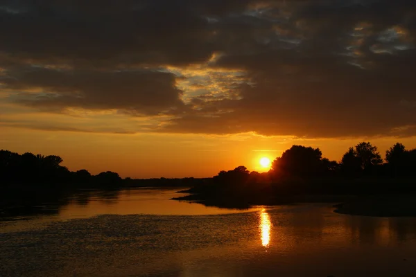 Закат на реке Стоковое Изображение