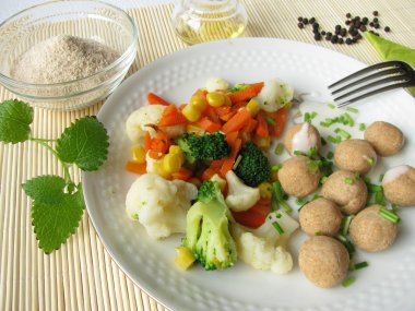 Tsampa dumplings with vegetables clipart