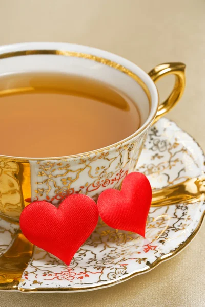 Gold cup tea — Stock Photo, Image