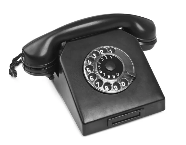 Old bakelite telephone on white — ストック写真