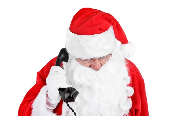 Santa claus receives a phone call — Stock Photo, Image