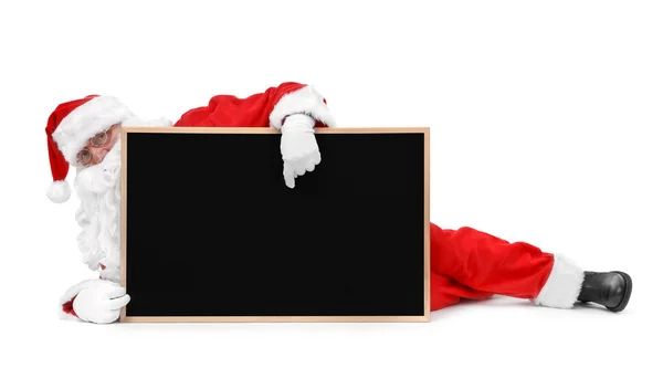 Weihnachtsmann und kleine Tafel — Stockfoto