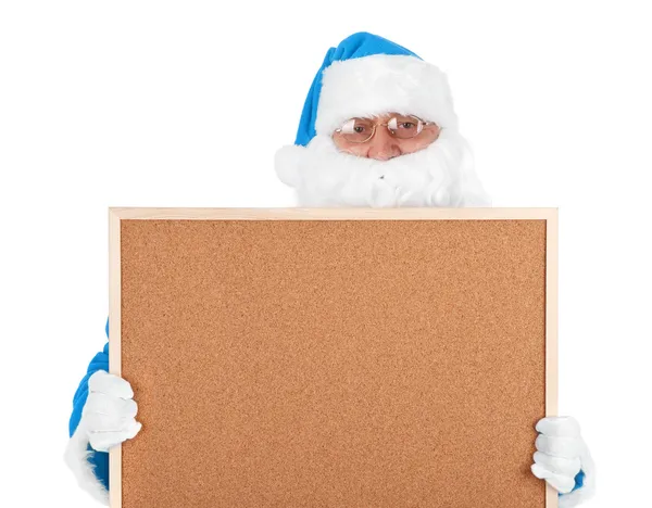Blue santa claus and part of empty bulletin board — Stock Photo, Image