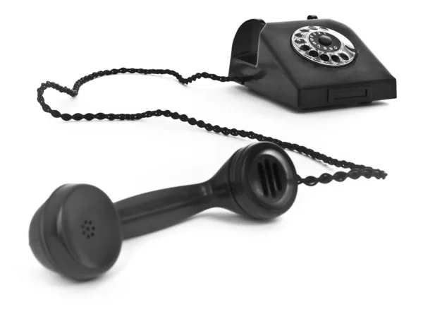 Старый бакелитовый телефон на белом — стоковое фото