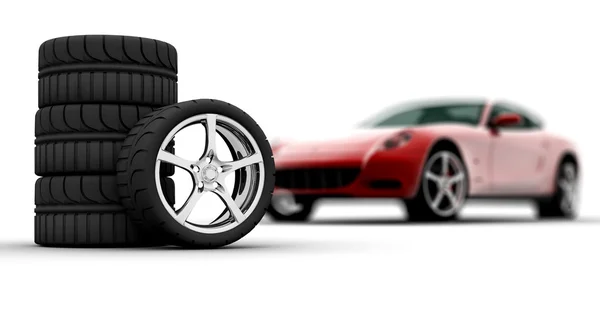 Hjul med en röd bil på bakgrund — Stockfoto