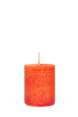 A red candle in front of white background clipart