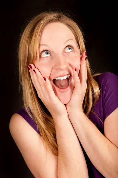 Funny portrait of a young female with wide open mouth Stock Picture