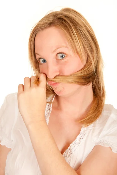 Young Woman Making Funny Face Playing Her Hair — Stock Photo, Image