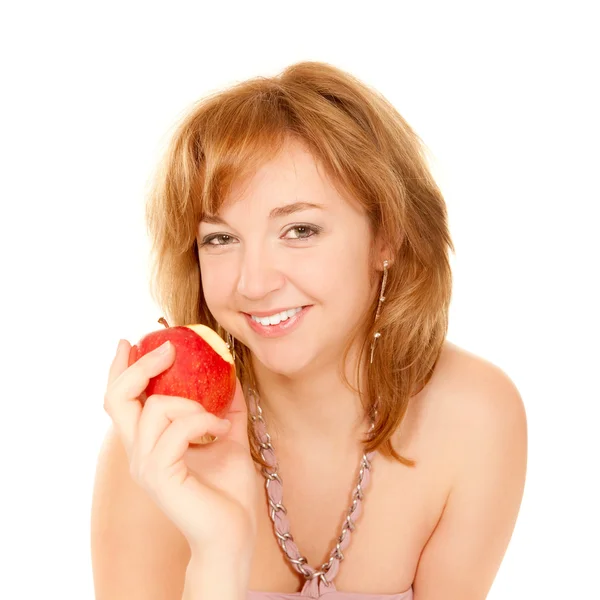 白で隔離され リンゴを食べてかなり若い女性の肖像画 — ストック写真