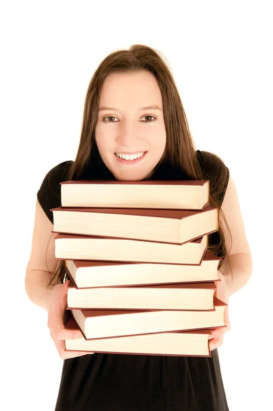 Bir yığın kitap ile genç bir öğrenci — Stok fotoğraf