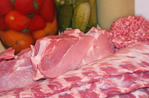 stock image Fresh variety of meats and pickles