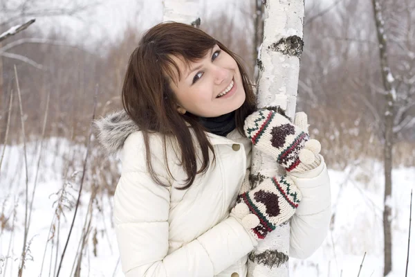 Cute girl walking in winter forest — Stock Photo, Image