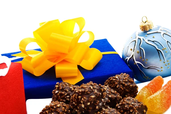 Gift en chocolade snoepjes. — Stockfoto