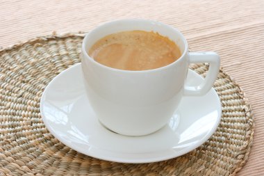 Close up view of white cup of espresso coffee clipart