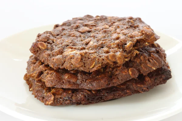 Brown oatmeal cookies on plate — Stock Photo, Image