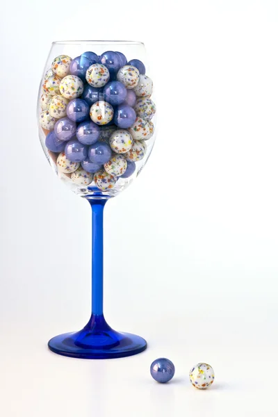 Colored spheres in a glass — Stock Photo, Image