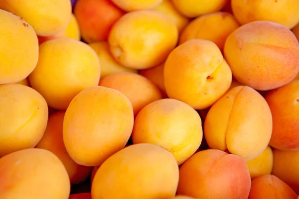 Hintergrund von gelben Pfirsichen — Stockfoto