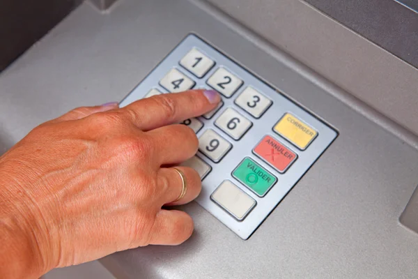 stock image Entering personal identification number on ATM dial panel