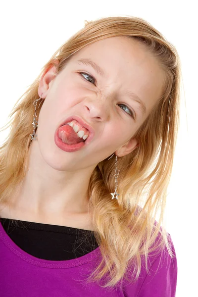 Young girl makes funny face — Stock Photo, Image