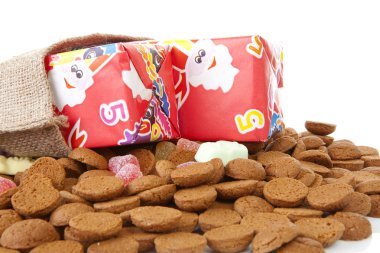 Bag with presents and typical dutch sweets: pepernoten (ginger n clipart