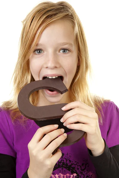Girl with big chocolate letter — Stock Photo, Image
