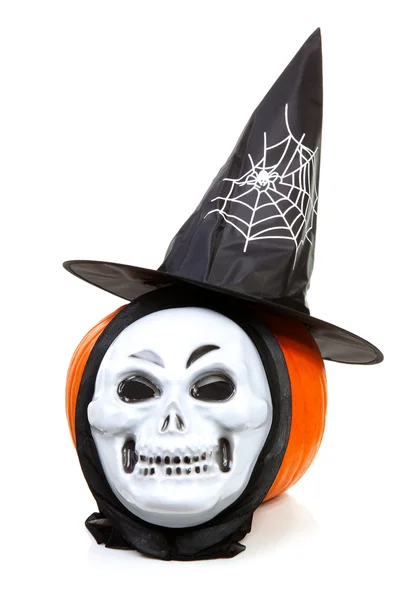 Abóbora com chapéu de bruxa e máscara — Fotografia de Stock