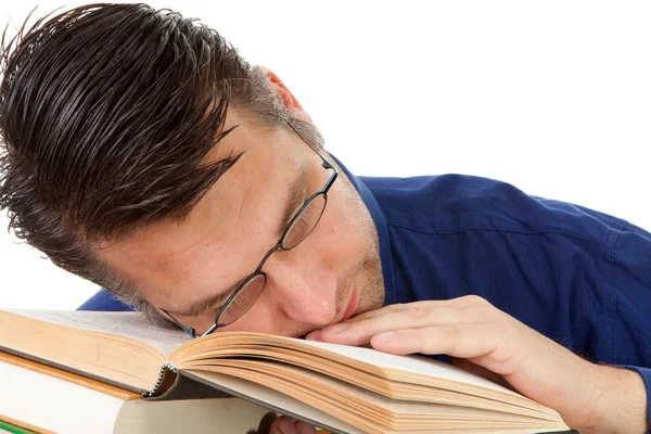 Nerdy geek fall asleep on books — Stock Photo, Image