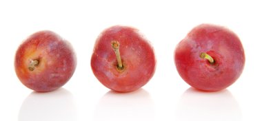 Three healthy plums clipart