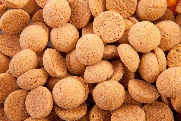 Bakgrund av typiska holländska godis: pepernoten (ingefära nötter) — Stockfoto