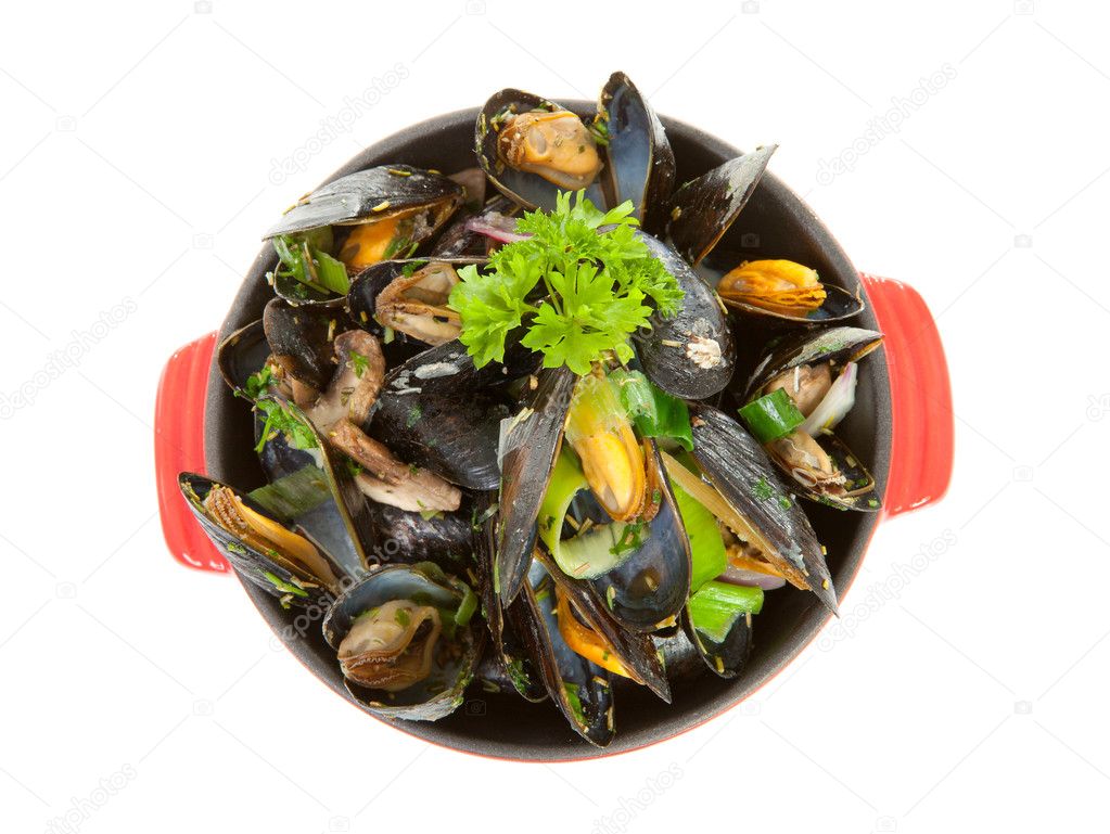 Cooked mussels in red casserole
