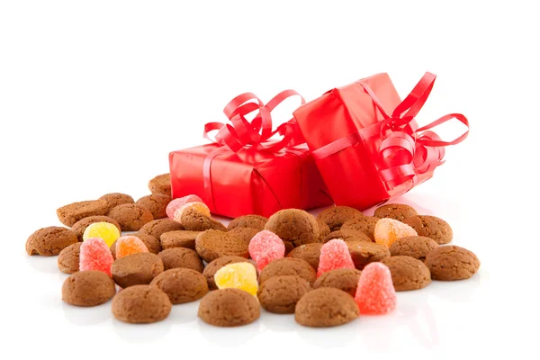 Typical dutch sweets: pepernoten and presents — Stock Photo, Image