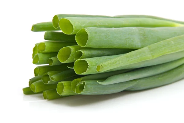 Front view of a pile spring onions in closeup — Stock Photo, Image