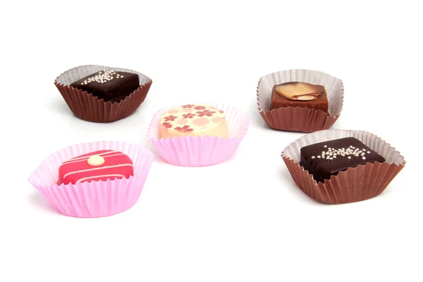 Five delicious pink petit four — Stock Photo, Image