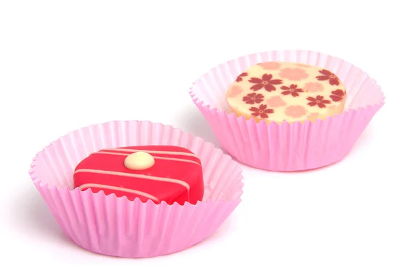 Two delicious pink petit four — Stock Photo, Image
