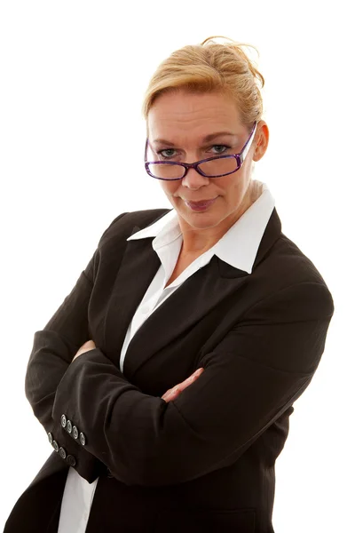 Businesswoman is looking with arms crossed — Stock Photo, Image