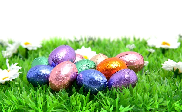 Colorful Easter Eggs Plastic Grass White Background — Stock Photo, Image