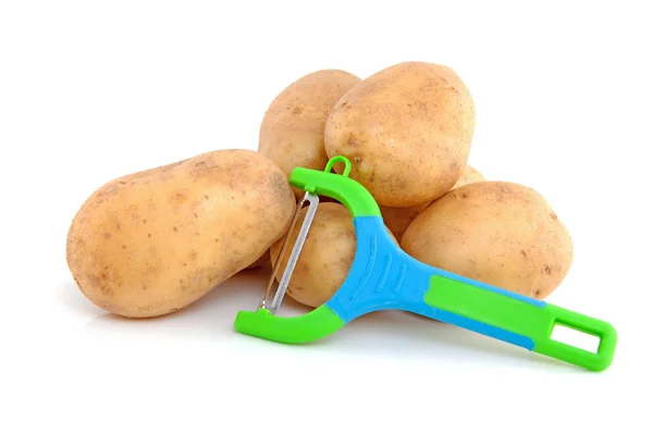 Stack Unpeeled Potatoes Colorful Peeling Knife Isolated White Background — Stock Photo, Image