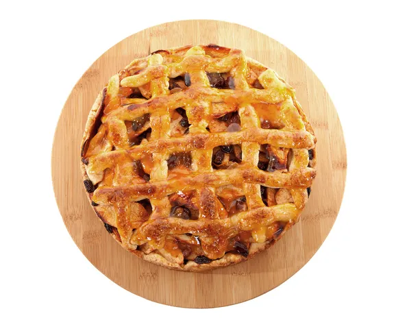 Delicious home baked apple pie on wooden cutting board — Stock Photo, Image