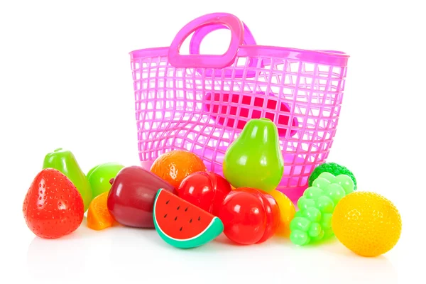 Růžové igelitová taška s plastovou s potravinami — Stock fotografie
