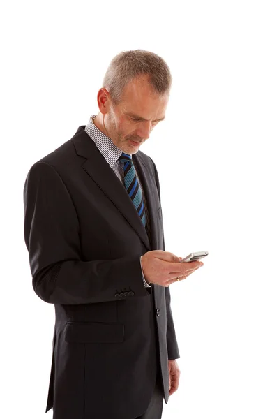 Uomo d'affari più anziano con smart phone — Foto Stock
