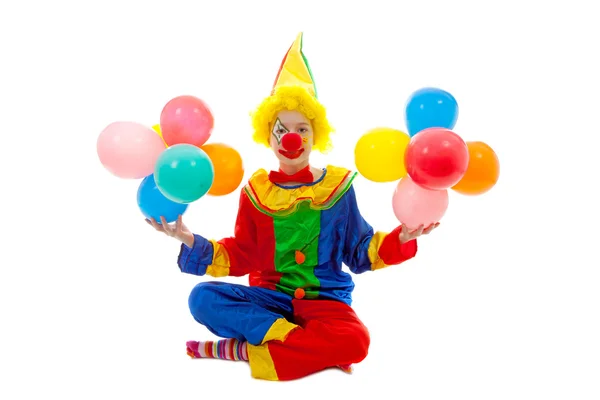 Barn klädd som färgglada rolig clown — Stockfoto
