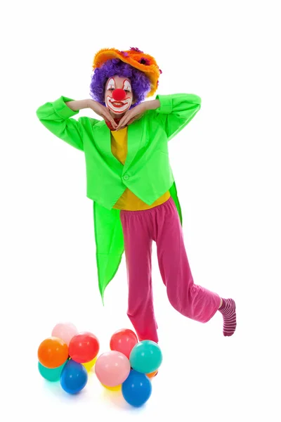 Barn klädd som färgglada rolig clown — Stockfoto