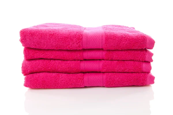 Montón de toallas rosadas — Foto de Stock