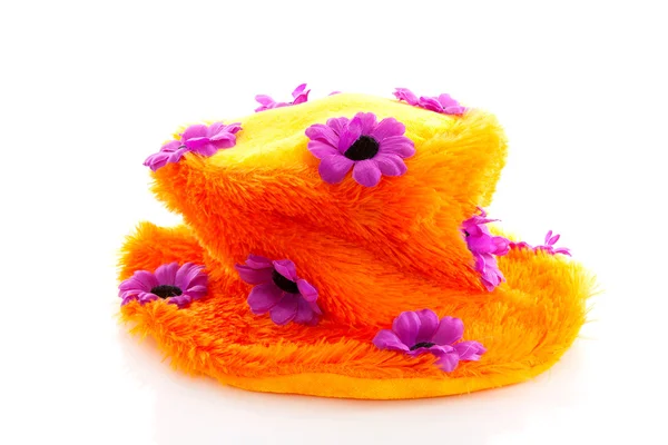 Furcsa narancssárga kalap, lila virágok — Stock Fotó