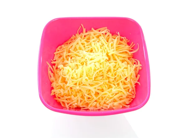Rosa skål med riven ost — Stockfoto