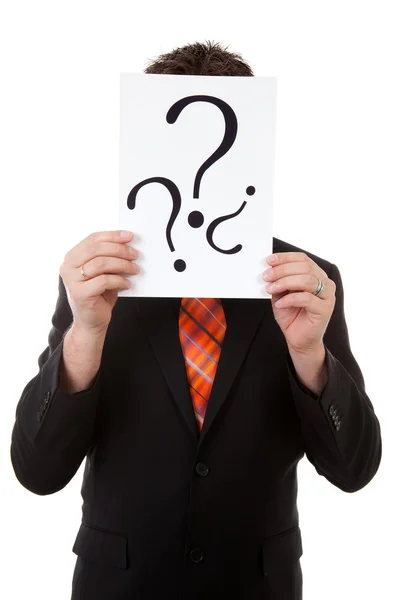 Businessman is holding board with question signs — Stock Photo, Image