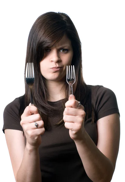 Woman deciding between plastic and reusable forks — Stock Photo, Image