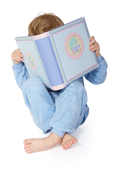 Little Child Reading Book Hiding Book Legs Crossed White Background — Stock Photo, Image