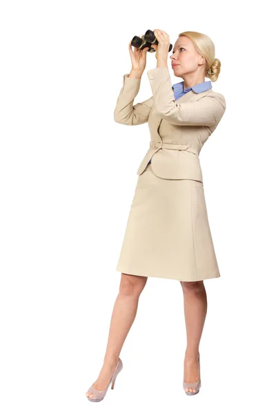 stock image Business woman looks through binoculars