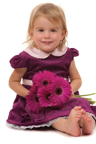 Enfant avec des fleurs Photo De Stock